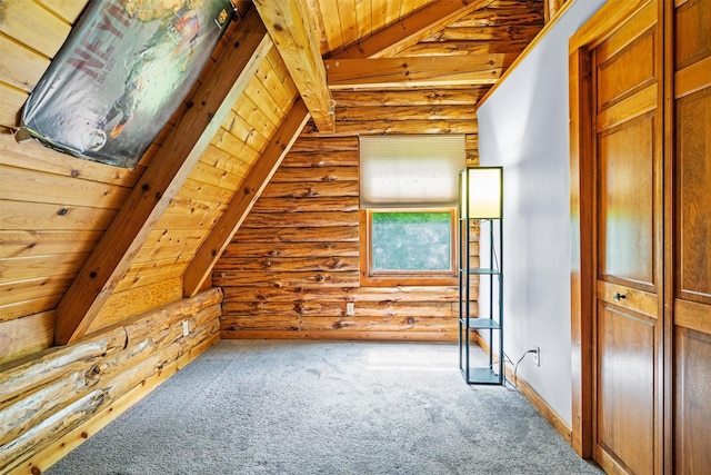 bonus room with rustic walls, wood ceiling, and carpet