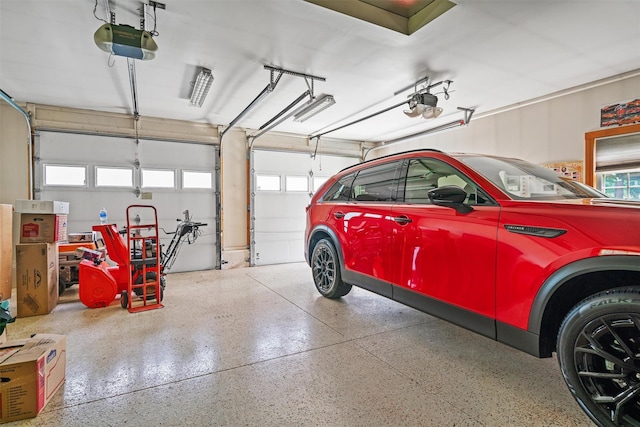 garage featuring a garage door opener
