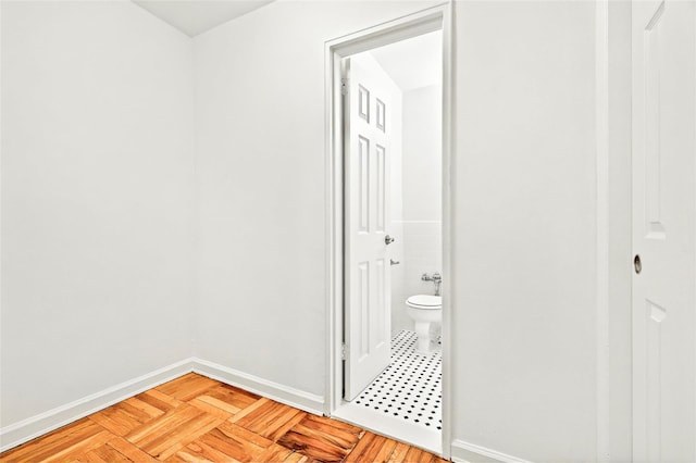 2244 Bronx Park E Unit 2E, Bronx, NY 10467 - bathroom featuring baseboards and toilet