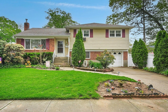 1243 Sylvia Ave, Baldwin, NY 11510 - split level home with brick siding, concrete driveway, a chimney, and an attached garage