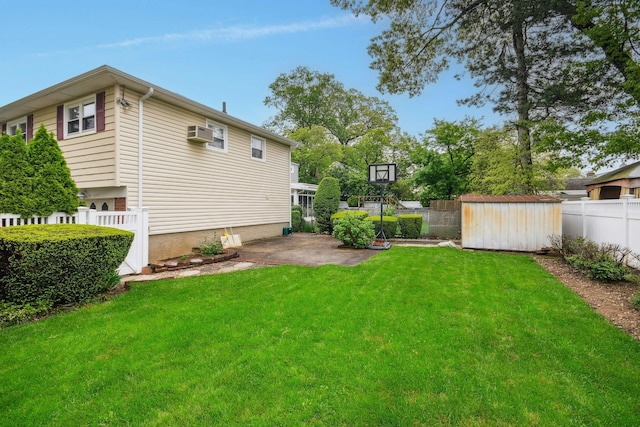 1243 Sylvia Ave, Baldwin, NY 11510 - view of yard featuring a shed, an outdoor structure, a patio, and a wall mounted AC