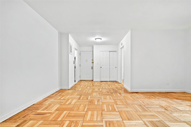 2244 Bronx Park E Unit 1E, Bronx, NY 10467 - hallway featuring baseboards