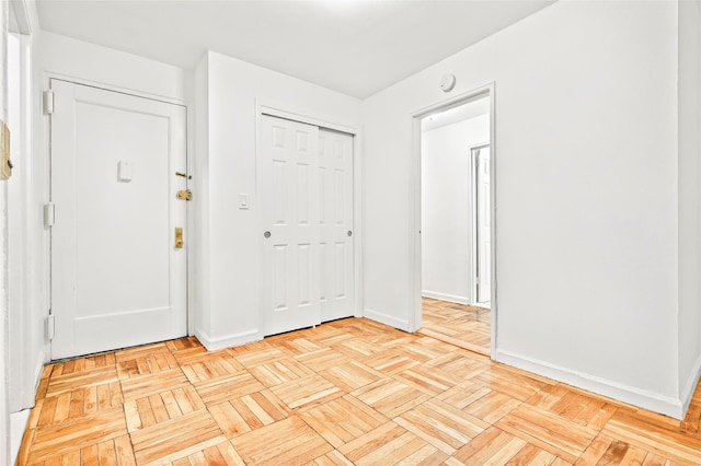 2244 Bronx Park E Unit 1E, Bronx, NY 10467 - foyer featuring baseboards