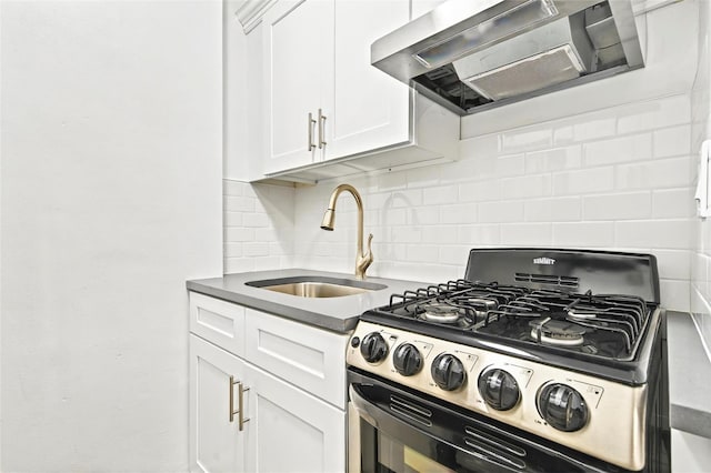 2244 Bronx Park E Unit 1E, Bronx, NY 10467 - kitchen featuring stainless steel range with gas cooktop, exhaust hood, a sink, backsplash, and white cabinets