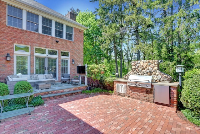 view of patio with grilling area, area for grilling, and outdoor lounge area