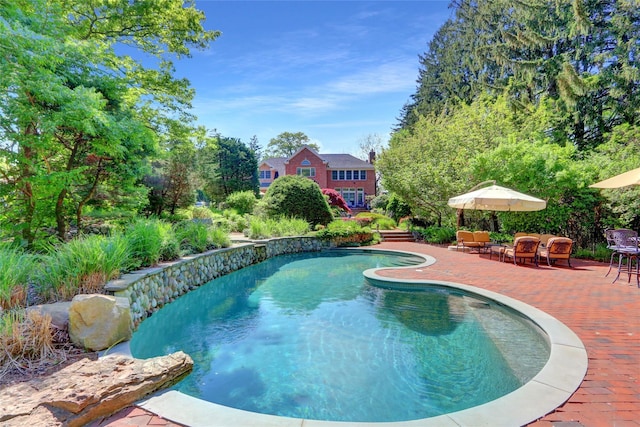 swimming pool with a patio