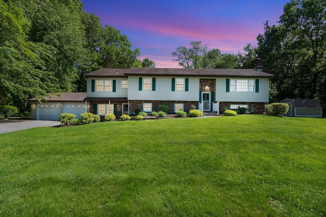 8 Anna D Ct, Hopewell Junction, NY 12533 - view of front of home with an attached garage, concrete driveway, a front yard, and brick siding
