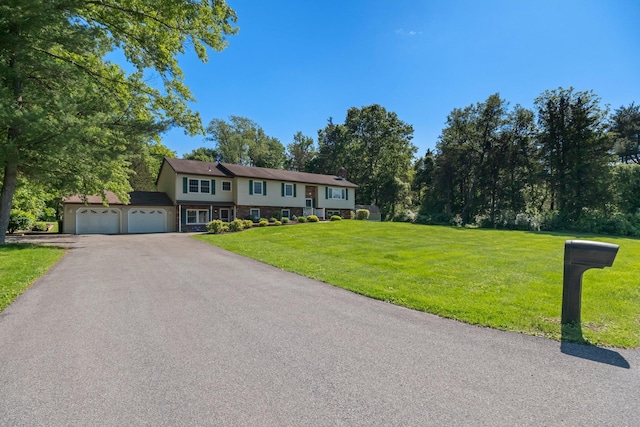 8 Anna D Ct, Hopewell Junction, NY 12533 - raised ranch featuring an attached garage, driveway, and a front lawn