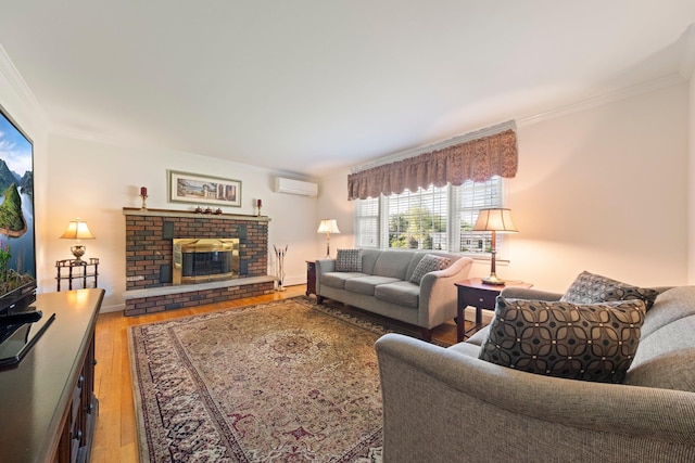 8 Anna D Ct, Hopewell Junction, NY 12533 - living room featuring a wall unit AC, crown molding, wood finished floors, a brick fireplace, and baseboards