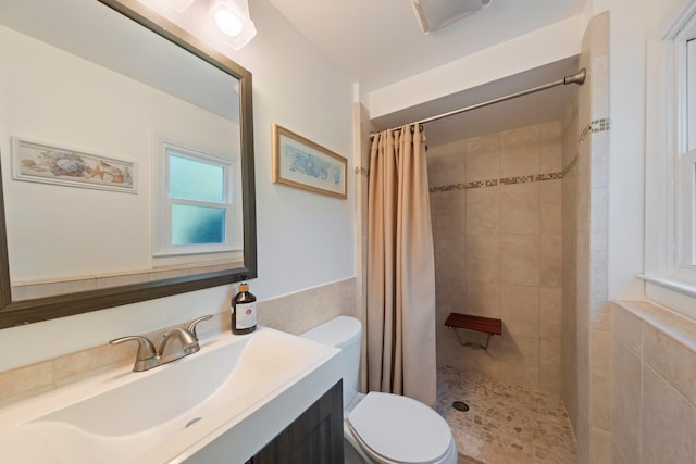 8 Anna D Ct, Hopewell Junction, NY 12533 - bathroom featuring toilet, vanity, tiled shower, and tile walls
