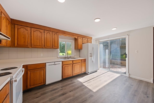 8 Anna D Ct, Hopewell Junction, NY 12533 - kitchen with white appliances, a sink, dark wood finished floors, brown cabinets, and recessed lighting