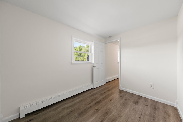 8 Anna D Ct, Hopewell Junction, NY 12533 - spare room featuring wood finished floors, a baseboard radiator, and baseboards