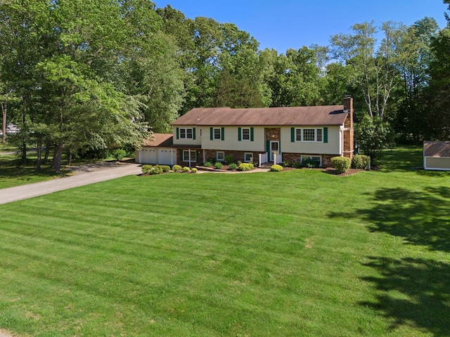 8 Anna D Ct, Hopewell Junction, NY 12533 - bi-level home featuring driveway, a front lawn, a chimney, and a garage