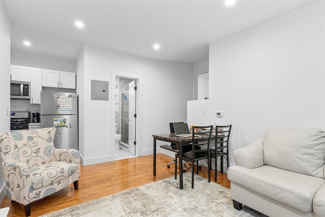 41AKA43 Sherwood Ave, Yonkers, NY 10704 - home office featuring electric panel, light wood finished floors, recessed lighting, and baseboards