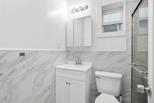 41AKA43 Sherwood Ave, Yonkers, NY 10704 - bathroom with tile walls, vanity, toilet, and wainscoting