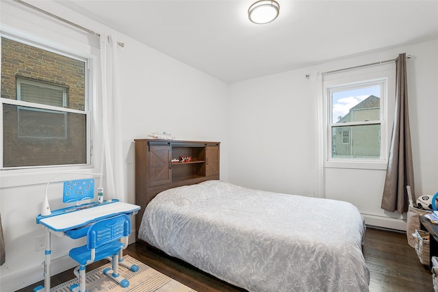 41AKA43 Sherwood Ave, Yonkers, NY 10704 - bedroom featuring dark wood finished floors and baseboard heating