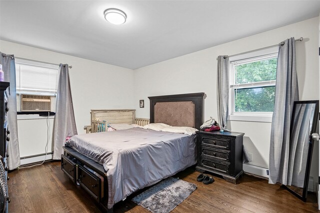 41AKA43 Sherwood Ave, Yonkers, NY 10704 - bedroom featuring baseboard heating, dark wood finished floors, and cooling unit