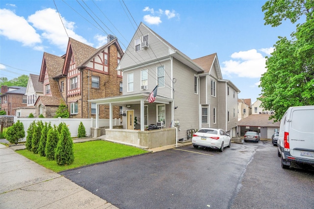 41AKA43 Sherwood Ave, Yonkers, NY 10704 - view of front of house featuring a residential view, covered porch, and uncovered parking