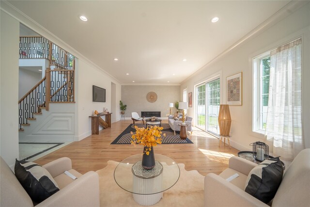 1259 Waterview Dr, Rockville Centre, NY 11570 - living room with ornamental molding, wood finished floors, stairway, recessed lighting, and baseboards