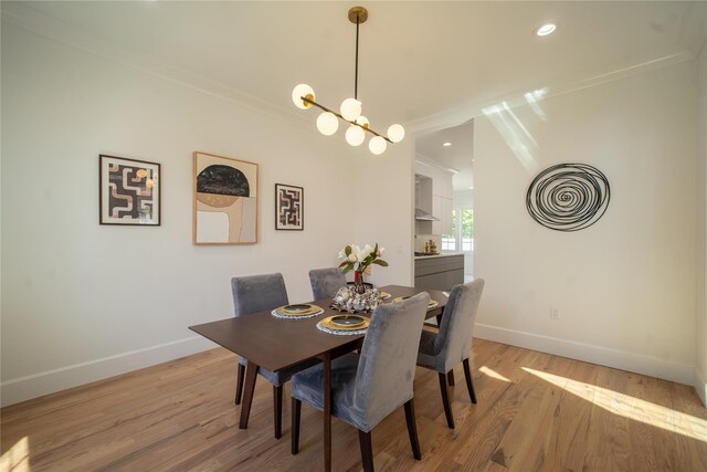1259 Waterview Dr, Rockville Centre, NY 11570 - dining room with baseboards, light wood finished floors, recessed lighting, and ornamental molding