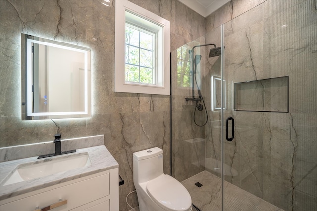 1259 Waterview Dr, Rockville Centre, NY 11570 - bathroom with a marble finish shower, toilet, vanity, and tile walls
