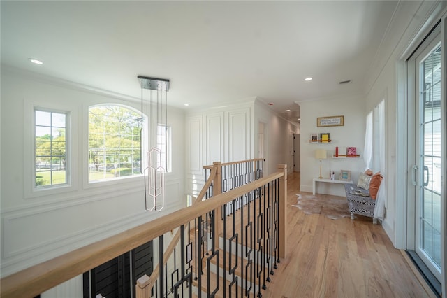 1259 Waterview Dr, Rockville Centre, NY 11570 - corridor featuring an upstairs landing, ornamental molding, light wood-style floors, and recessed lighting