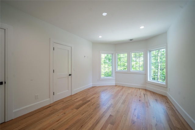 1259 Waterview Dr, Rockville Centre, NY 11570 - spare room with light wood-type flooring, baseboards, and recessed lighting