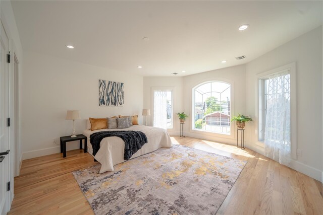 1259 Waterview Dr, Rockville Centre, NY 11570 - bedroom featuring baseboards, light wood finished floors, and recessed lighting