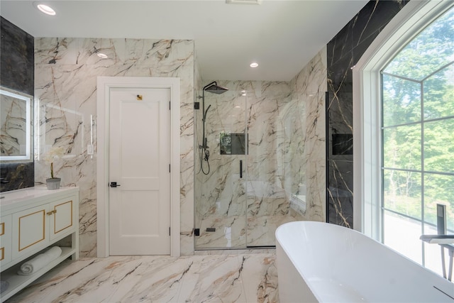 1259 Waterview Dr, Rockville Centre, NY 11570 - bathroom featuring a marble finish shower, vanity, a freestanding tub, marble tiled flooring, and recessed lighting