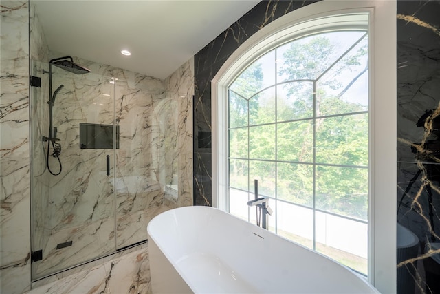 1259 Waterview Dr, Rockville Centre, NY 11570 - full bathroom with a marble finish shower, a freestanding bath, recessed lighting, plenty of natural light, and tile walls