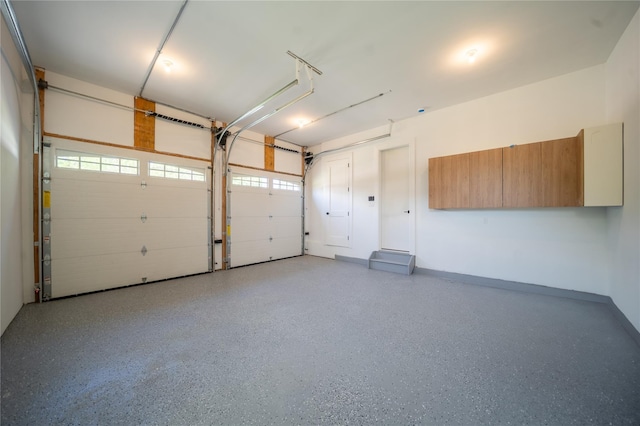 1259 Waterview Dr, Rockville Centre, NY 11570 - garage featuring baseboards