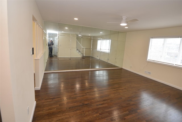spare room with baseboards, wood finished floors, recessed lighting, and ceiling fan