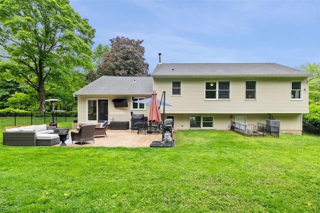 rear view of house with an outdoor living space, a patio, and central AC unit