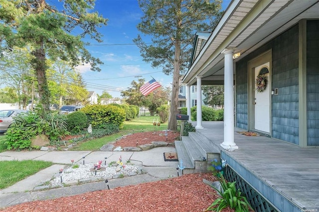 80 Monell Ave, Islip, NY 11751 - view of yard featuring covered porch