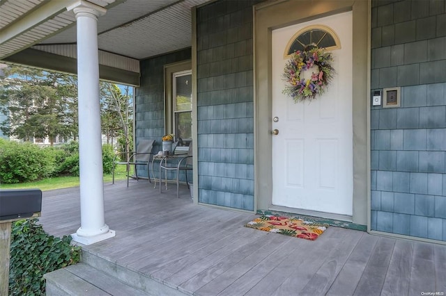 80 Monell Ave, Islip, NY 11751 - doorway to property featuring a porch