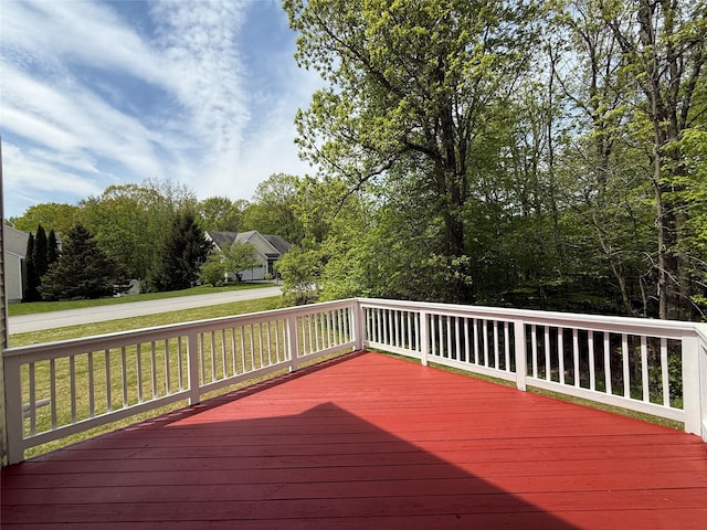 deck featuring a lawn