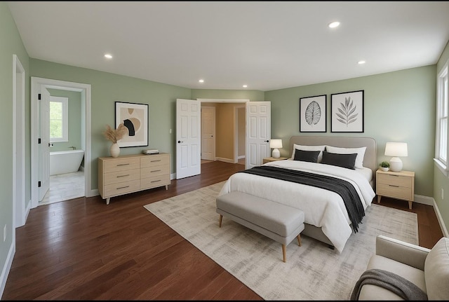 bedroom featuring dark wood-style flooring, baseboards, and recessed lighting