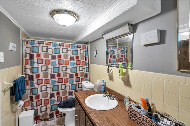 17 Gerhard Rd, Plainview, NY 11803 - full bathroom with tile walls, toilet, crown molding, a shower with curtain, and vanity