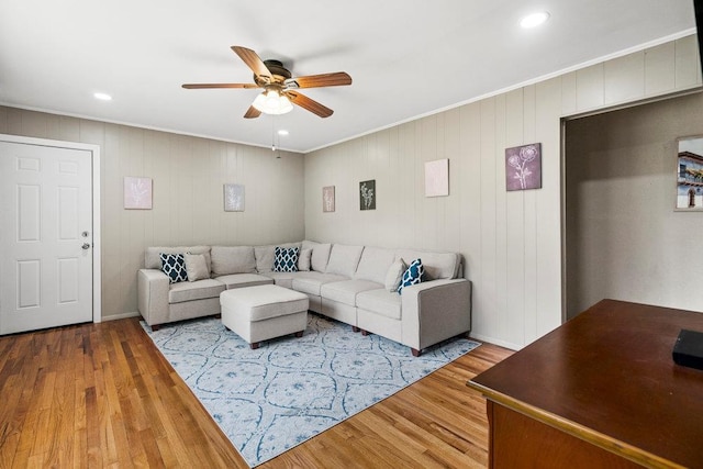 1544 Baldwin Blvd, Bay Shore, NY 11706 - living room featuring a ceiling fan, wood finished floors, crown molding, and recessed lighting