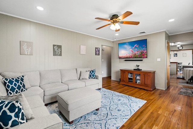 1544 Baldwin Blvd, Bay Shore, NY 11706 - living area featuring ornamental molding, ceiling fan, wood finished floors, and recessed lighting
