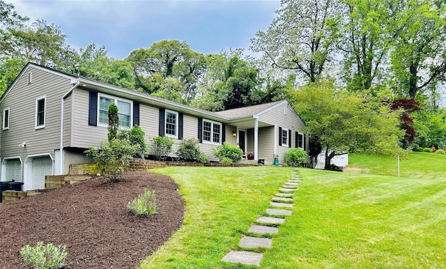 2 W Rd, East Setauket, NY 11733 - ranch-style house featuring a garage, a front lawn, and view of scattered trees