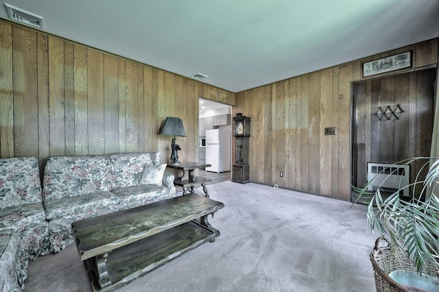 93 Broadway, Massapequa Park, NY 11762 - carpeted living area featuring wooden walls