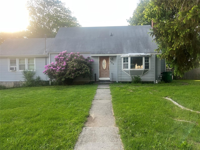 765 Wolcott Ave, Beacon, NY 12508 - cape cod-style house with a front yard