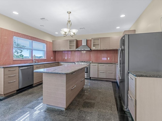 12 Pleasant Ave, Port Washington, NY 11050 - kitchen with stainless steel appliances, wall chimney exhaust hood, granite tiled floors, a sink, and recessed lighting
