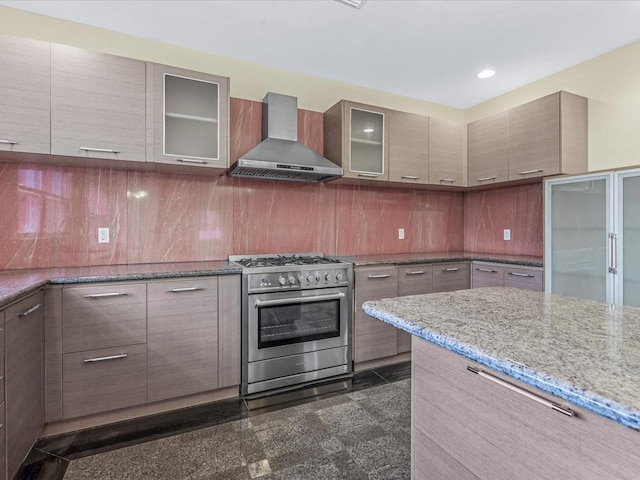 12 Pleasant Ave, Port Washington, NY 11050 - kitchen with gas stove, wall chimney range hood, granite tiled floors, modern cabinets, and recessed lighting