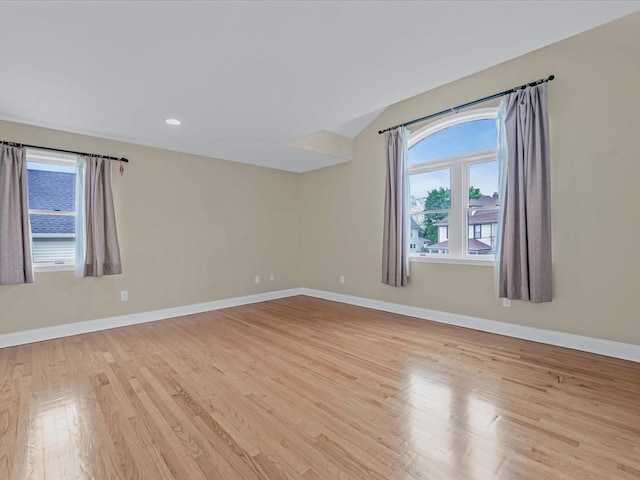 12 Pleasant Ave, Port Washington, NY 11050 - empty room featuring light wood finished floors, baseboards, and recessed lighting