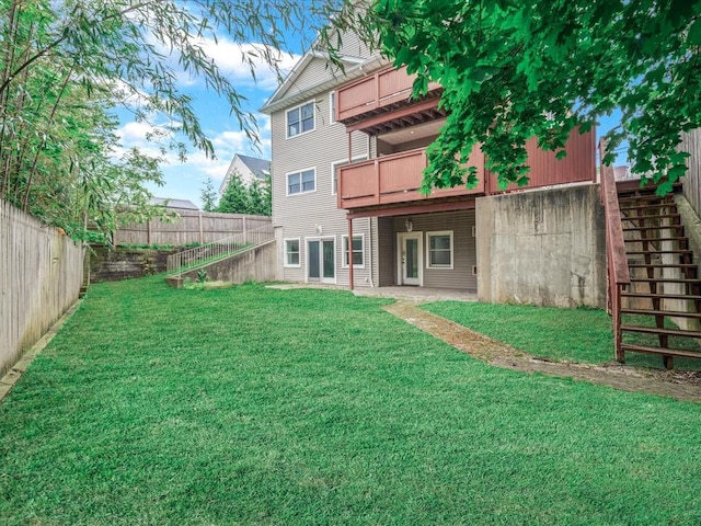 12 Pleasant Ave, Port Washington, NY 11050 - rear view of property featuring stairs and a wooden deck