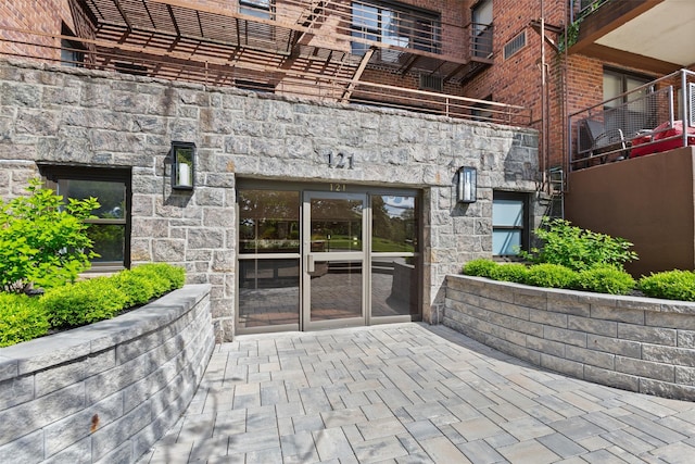121 S Highland Ave Unit 4B, Ossining, NY 10562 - entrance to property featuring a patio area and stone siding