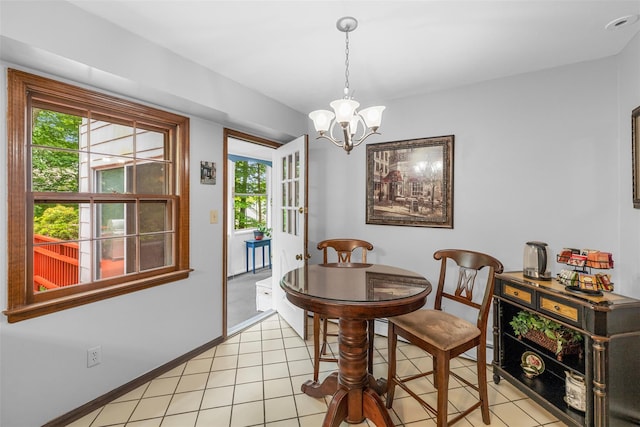 11 Carnelli Ct, Poughkeepsie, NY 12603 - dining room featuring plenty of natural light, a chandelier, and baseboards