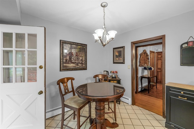 11 Carnelli Ct, Poughkeepsie, NY 12603 - dining space featuring baseboard heating, a chandelier, and light tile patterned flooring